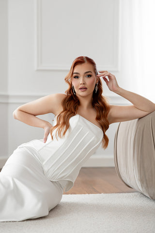 Satin corset bridal top with a contoured fit, paired with a sleek column skirt for modern sophistication.