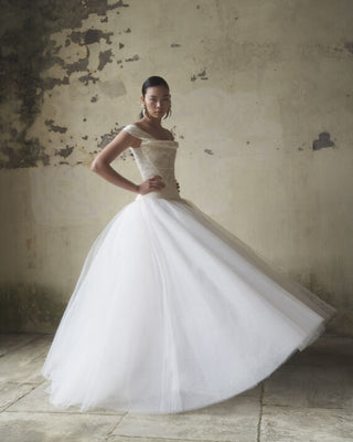 Side view of the Comet Corset paired with the Joe Petticoat, showcasing the flattering profile and off-shoulder effect.