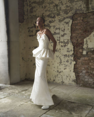 Cora Skirt in white, styled with a strapless corset top for a sleek, modern bridal look.
