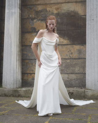 Vivienne Westwood couture Galaxy Cape Gown, highlighting British tailoring, FSC-certified satin, and timeless bespoke elegance.