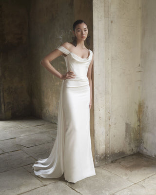 Vivienne Westwood couture Nova Grace gown in FSC Soft Stretch Satin with signature corset bodice and asymmetrical neckline.