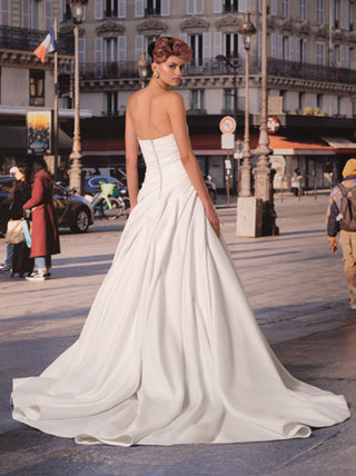 Viktor&Rolf bespoke A-line wedding dress showcasing couture draping, luxury mikado fabric, and heritage artistry for high-fashion brides