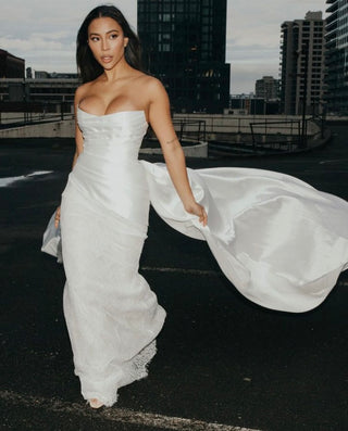 Refined strapless formal top featuring a corseted mikado bodice, perfect for black-tie events.