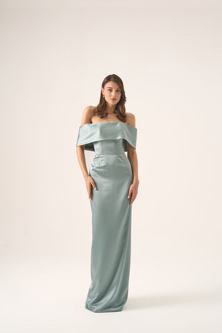 Full-length front view of a model wearing the Amelia satin column gown, showcasing the off-the-shoulder neckline and graceful silhouette.
