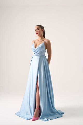 Elegant A-line gown with a plunging V-neckline, delicate spaghetti straps, and a high slit for graceful movement.