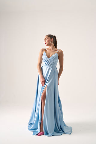 Stunning formal dress with a flowing A-line shape, plunging neckline, and delicate spaghetti straps for a chic silhouette.