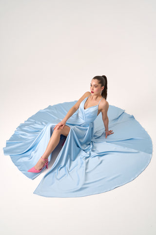 Beautiful A-line satin gown with a plunging neckline and high slit, ideal for glamorous events and formal occasions.