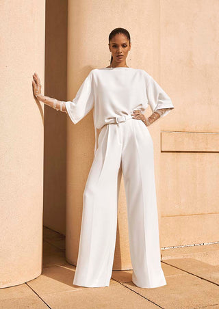 Front view of the Cheyenne Top by Pronovias with a boat neckline.