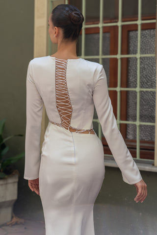 Luxury column wedding dress showcasing a structured crew neckline, sleek waist cutout, and long sleeves for a flawless bridal fit.
