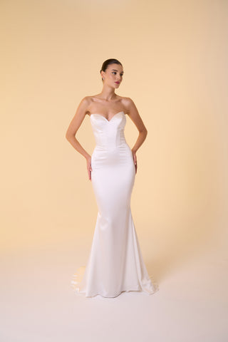 Drop waist mermaid bridal gown with structured sweetheart neckline and luxurious satin fabric for a timeless silhouette