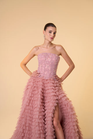 Sophisticated tulle ball gown showcasing intricate floral detailing and a flattering strapless neckline.