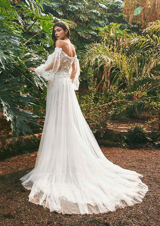 Glamorous tulle and lace bridal dress with sparkling embellishments.