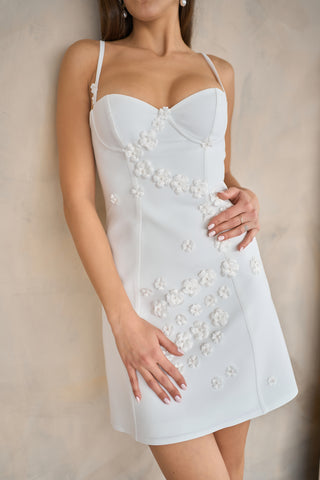 Sheath-style mini dress featuring a structured sweetheart neckline and elegant spaghetti straps for formal occasions.