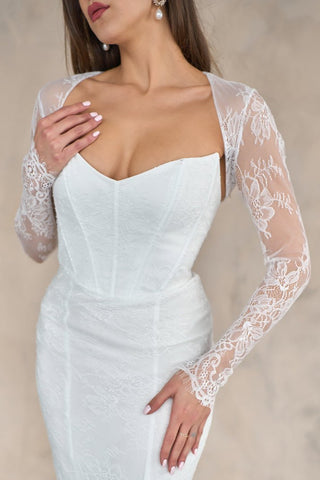 Italian lace bolero with long sleeves, intricate floral embroidery, scalloped cuffs, and a lightweight sheer design for bridal elegance.
