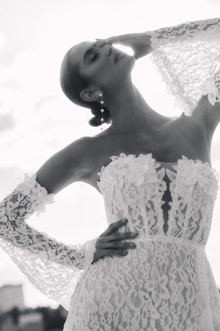 Mia Lavi handmade couture wedding gown crafted from delicate floral lace, designed for high-end brides seeking exclusivity