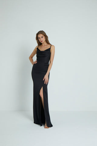 Sophisticated column evening gown with a flowing satin skirt, delicate straps, and a flattering cowl neckline design.