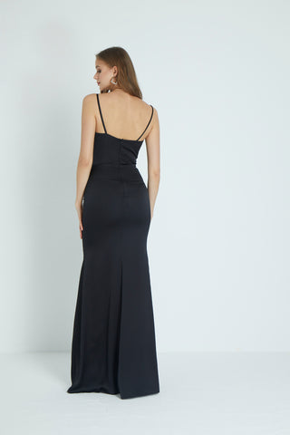Chic maxi-length dress with a cowl neckline, minimalist spaghetti straps, and a thigh-high slit designed for evening elegance.