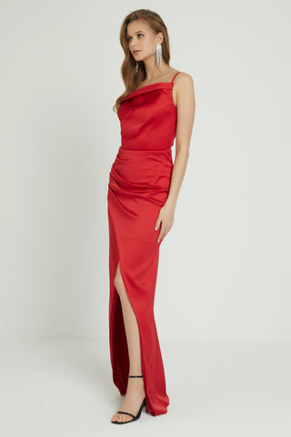 Sophisticated column gown with an asymmetrical neckline, corseted bodice, and draped detailing for a sculpted silhouette.