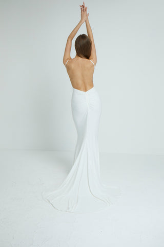 Luxury mermaid silhouette with deep V-neck and low V-shaped back for a daring evening dress