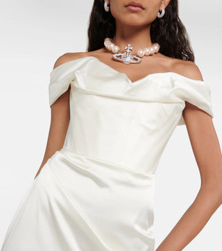 Close-up of the delicate draping along the hips of the Nova Cora gown, capturing the fine craftsmanship and fluid design.