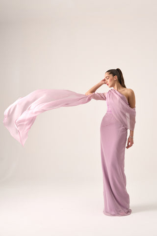 Elegant evening gown with a flowing maxi-length silhouette and dramatic asymmetric neckline with cape sleeves.