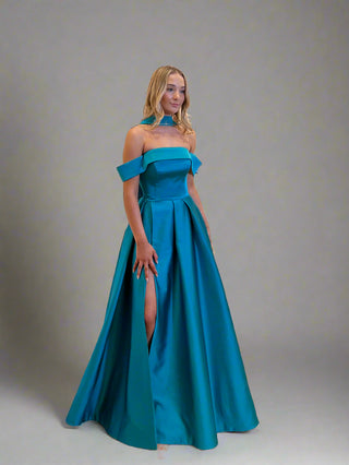 Strapless ballgown with a voluminous taffeta skirt and structured bodice, perfect for formal evening elegance.