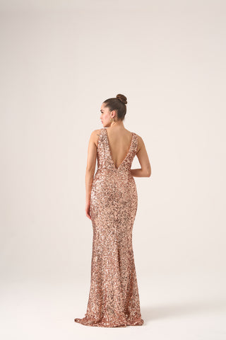 Floor-length sequin dress with a dramatic plunging neckline, sleek design, and sultry thigh-high slit.