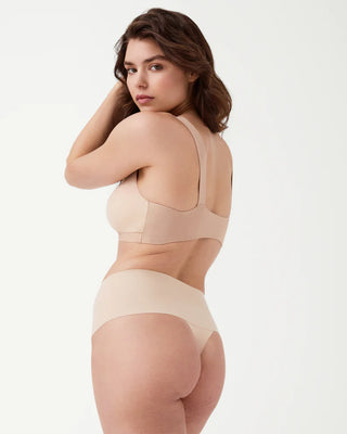 Undie-tectable® Thong by Spanx, back view emphasizing the sleek design and bonded waistband for a smooth finish.