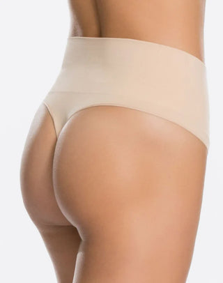 Back view of the Everyday Shaping Panties Thong by Spanx, illustrating the seamless design and minimal stitching for a smooth, invisible look under clothing.