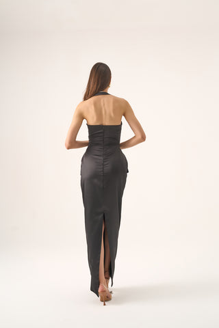 Timeless column gown featuring ruched detailing and halter neckline for a refined, formal look.