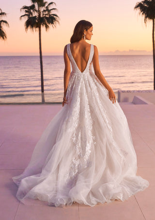 Lightweight bridal dress with organza layers and flowing A-line skirt.