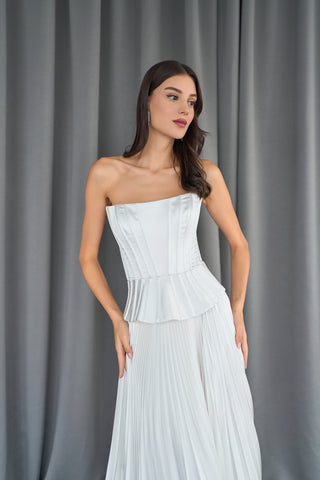Peplum detail and strapless neckline for a sleek, timeless bridal statement.