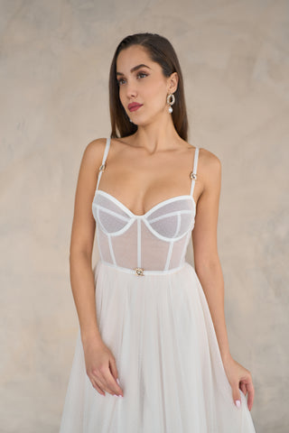 Graceful tulle midi dress with a structured bodice, romantic sweetheart neckline, and airy A-line design.