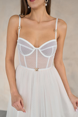Sophisticated evening midi dress with a feminine sweetheart neckline and flattering spaghetti straps.