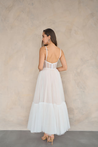 Elegant midi-length evening dress featuring spaghetti straps, a corset bodice, and a timeless A-line design.