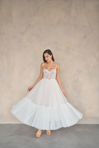 Enchanting tulle midi dress with a corset-style bodice and sweetheart neckline, perfect for formal occasions.