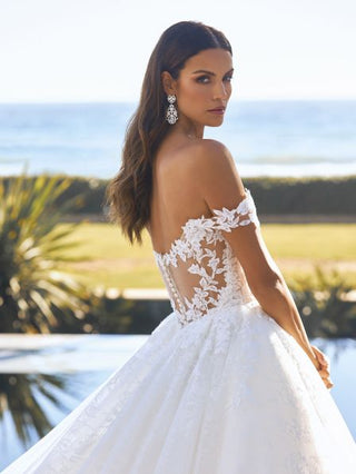 Romantic lace bodice and embossed tulle skirt on the Delphine dress.