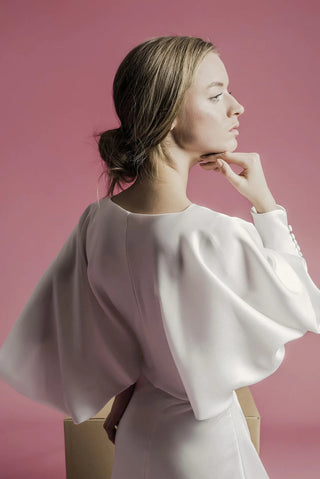 Sophie et Voilà Elsa gown with cinched waist detail.