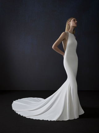 Galaxy bridal gown featuring elegant tailoring and halter design.