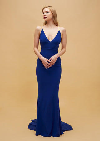 Sophisticated gown with deep V-neckline and sleek open back for an evening-ready look