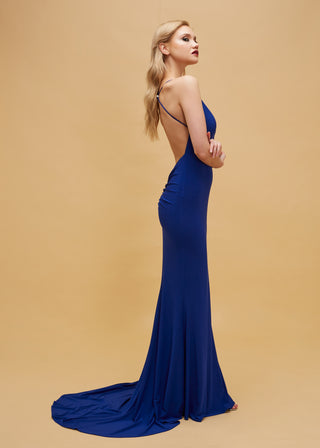 Sleek evening gown featuring spaghetti straps, deep V-neckline, and elegant train