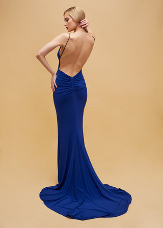 Refined mermaid silhouette with delicate spaghetti straps and dramatic open back
