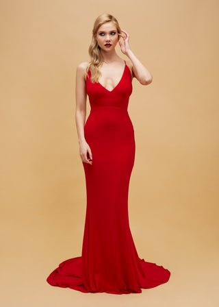Sophisticated form-fitting gown featuring a V-neckline and delicate spaghetti straps