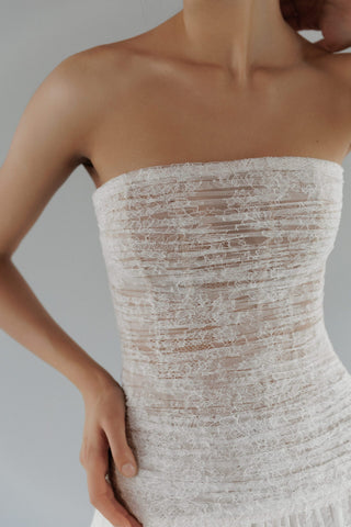 Daalarna bespoke bridal dress featuring signature dropped waistline and couture lace detailing