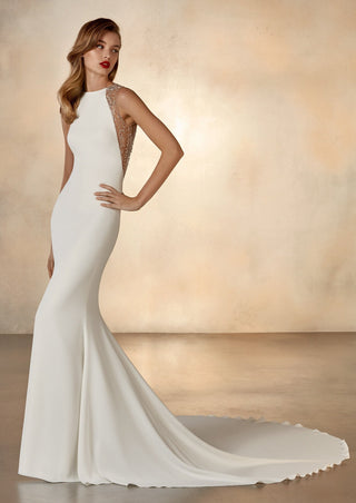 Galaxy gown by Pronovias Prive with halter neckline and mermaid cut.