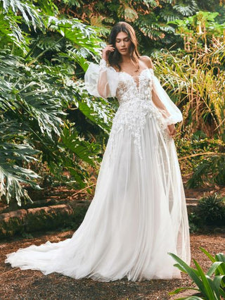 Lenkois by Pronovias features luxe tulle, lace, sequins, and beads. A glamorous gown for the discerning bride. Sample available in size US 8.