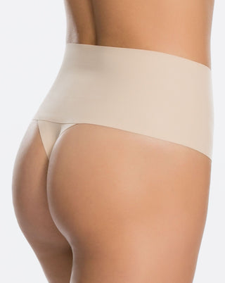 Undie-tectable® Thong by Spanx, back view highlighting the seamless edges and minimal VPL design.