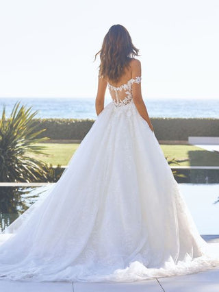 Back view of the Delphine gown with button-down illusion lace detail.
