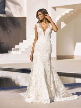 Lyra Lace gown by Pronovias with beaded lace and tulle overlay.