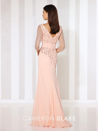 Refined formal dress featuring fitted silhouette, beaded detailing, elegant V-neck, and illusion sleeves